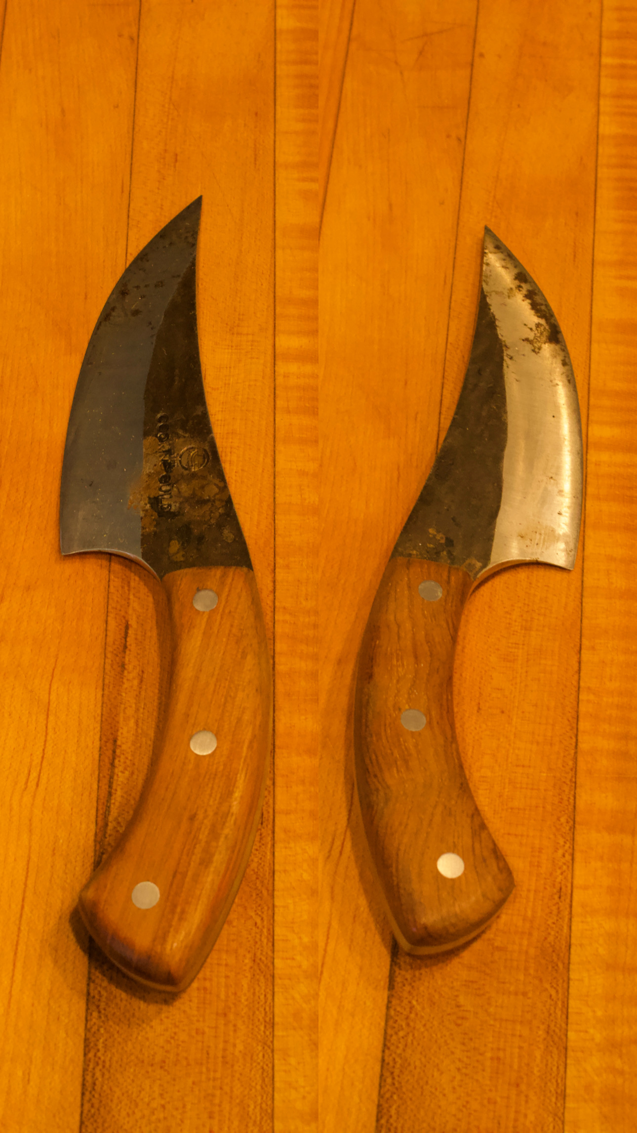A cleaver shown before and after sharpening, with a dark worn edge on the left and a bright sharpened edge on the right